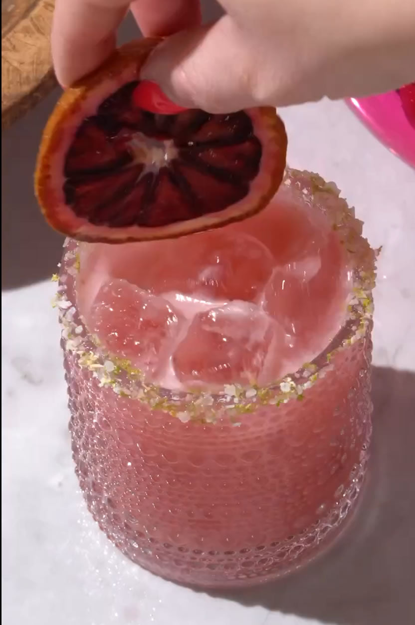 This margarita blends blood orange, coconut, and BIATCH® Reposado for a perfectly sweet, tart, and smooth sip.