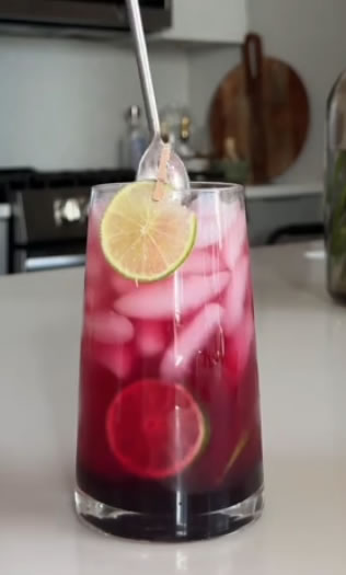 This tequila smash is a bright, fizzy blend of blueberries, lime, and BIATCH® Rosa—perfect for sunny days and patio vibes.