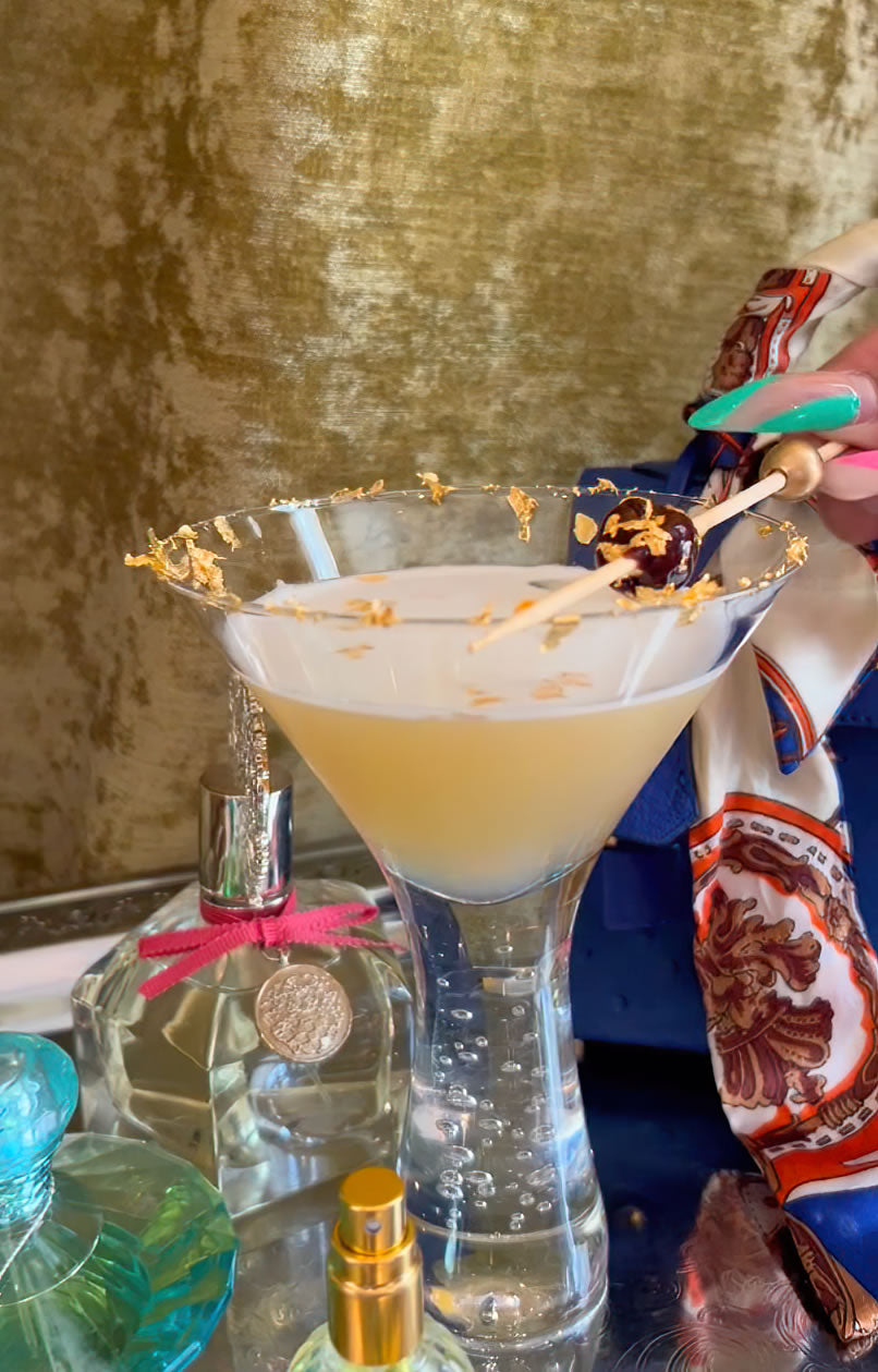 This luxurious cocktail combines BIATCH reposado, Lillet blanc, and maraschino liqueur, garnished with edible gold flakes and a gilded Amarena cherry.